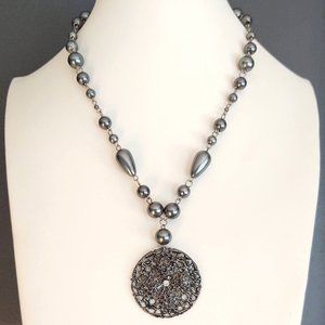 Steel gray beaded necklace with metal pendant and cz accent